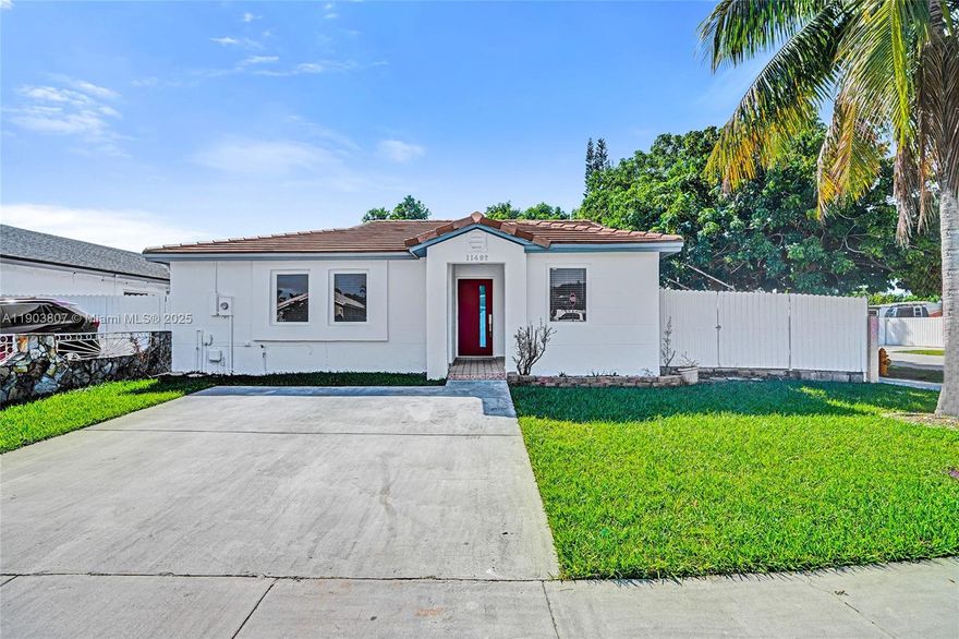 Welcome to this charming and move-in ready 3-bedroom, 2-bath corner home featuring 1,225 sq.ft. of living area in a highly desirable neighborhood near Zoo Miami, with easy access to the Florida Turnpike, Walmart, restaurants, schools, and parks. This home offers peace of mind with a concrete roof, A/C units, and impact windows all updated in 2021. Inside, you’ll find upgraded flooring and a modern kitchen, freshly painted interiors, and an open layout perfect for entertaining. The spacious fenced patio includes a covered terrace, a separate laundry/storage room, and enough space to add a pool. Enjoy the outdoors surrounded by eight different fruit trees, creating your own private tropical retreat. Move-in ready, beautifully maintained, and ideally located — this home checks all the boxes!