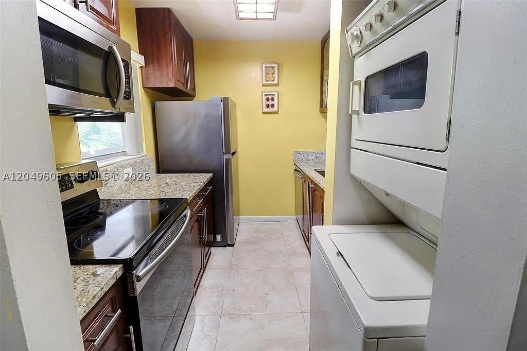 Photo of 3246 NW 102nd Ter #308-F, Coral Springs, FL 33065 (MLS # A12049605)