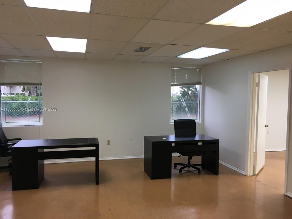 1ST FLOOR OFFICE SPACE. ONE PRIVATE OFFICE AND AN OPEN ADMINISTRATION AREA AND A STORAGE ROOM. COMMON AREA RESTROOM. VCT FLOORING.