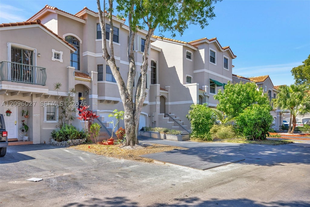 Photo of 12662 NW 14th St, Sunrise, FL 33323 (MLS # A12096027)