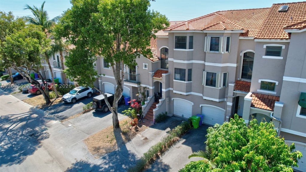 Photo of 12662 NW 14th St, Sunrise, FL 33323 (MLS # A12096027)