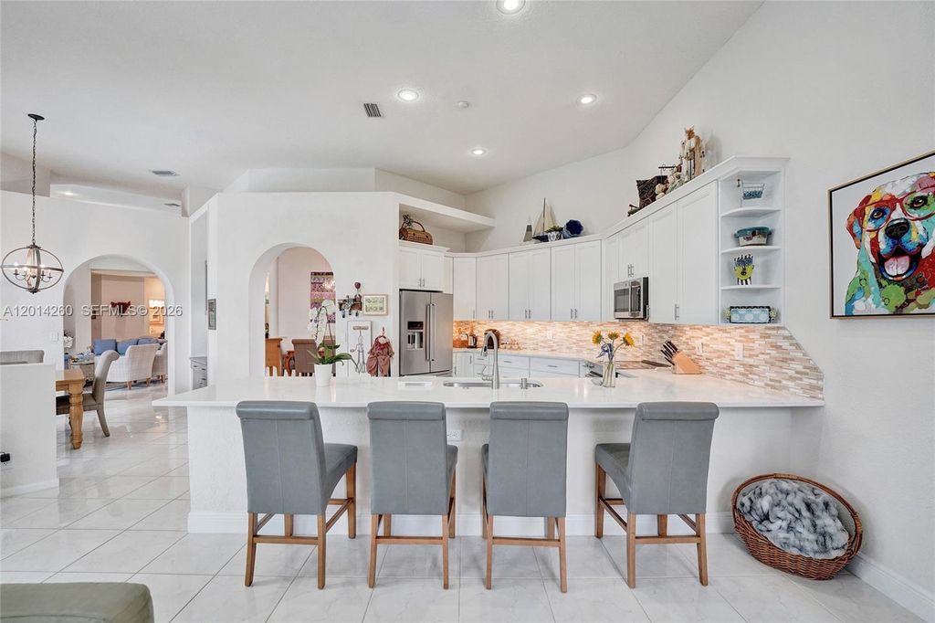 Photo of 1640 Island Way, Weston, FL 33326 (MLS # A12014260)