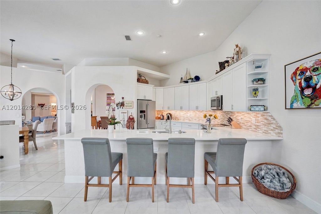 Photo of 1640 Island Way, Weston, FL 33326 (MLS # A12014260)