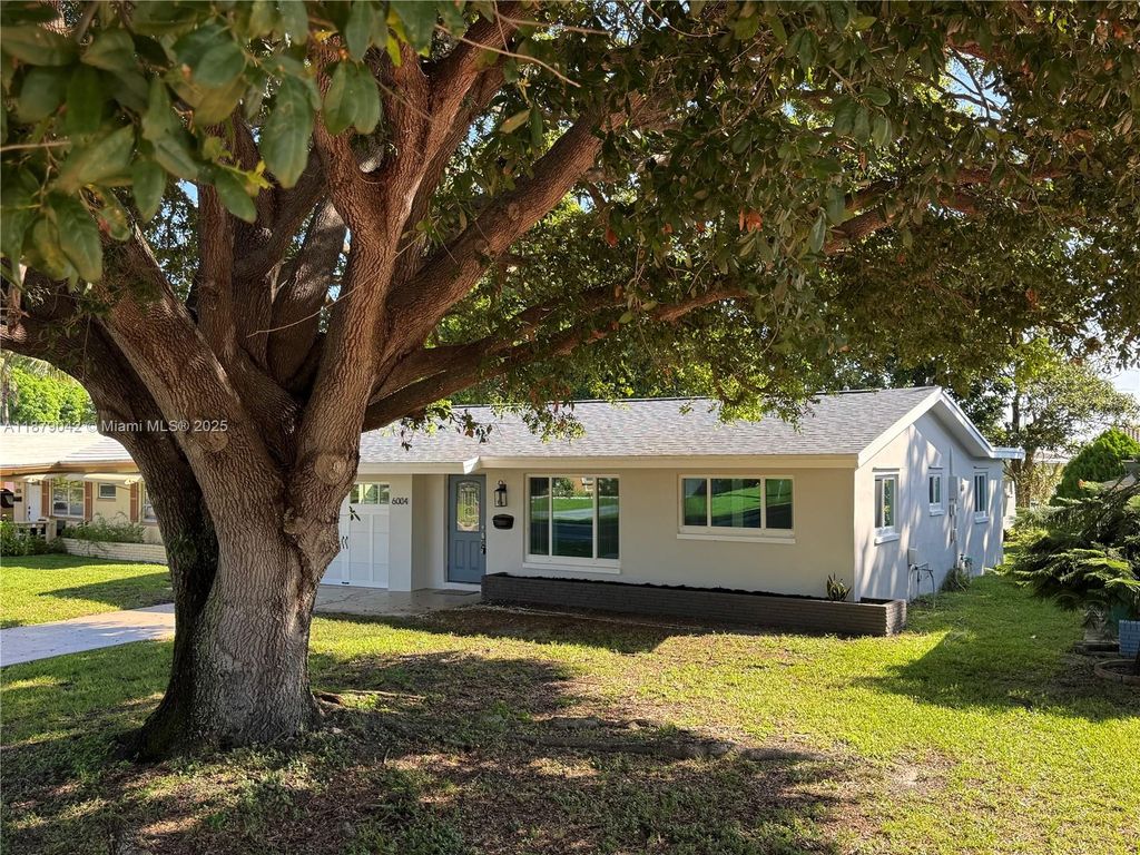 Photo of 6004 NW 70th Ave, Tamarac, FL 33321 (MLS # A11879042)