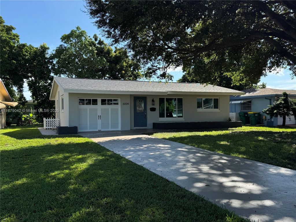 Photo of 6004 NW 70th Ave, Tamarac, FL 33321 (MLS # A11879042)