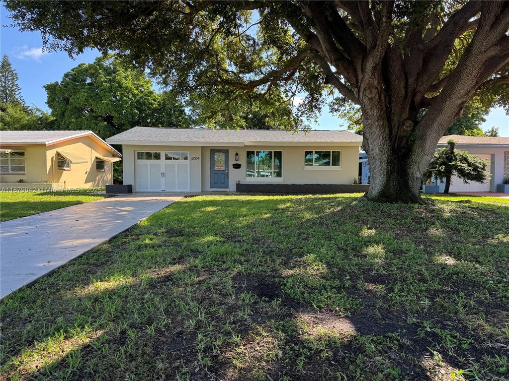 Photo of 6004 NW 70th Ave, Tamarac, FL 33321 (MLS # A11879042)