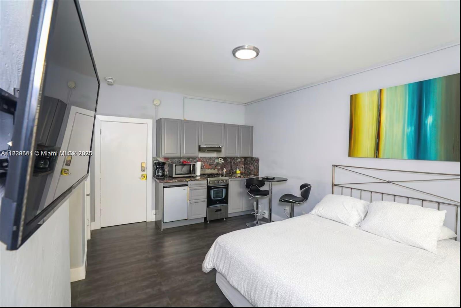 Fully Furnished Studio – One Block from the Beach!
This charming, move-in-ready studio is the perfect coastal retreat, just one block from the beach! Offered fully furnished, the unit features an open layout with a cozy sleeping area, wall-mounted TV, and a stylish kitchenette, granite countertops, and modern appliances including a stove, microwave, and coffee maker.
Natural light, clean finishes, and tasteful design make this space both practical and welcoming.
Located in a secure building with elevator access, you’re just moments away from the beach, shops, dining, and all the best of Miami Beach living. Perfect for short-term rentals, seasonal stays, or a low-maintenance getaway.