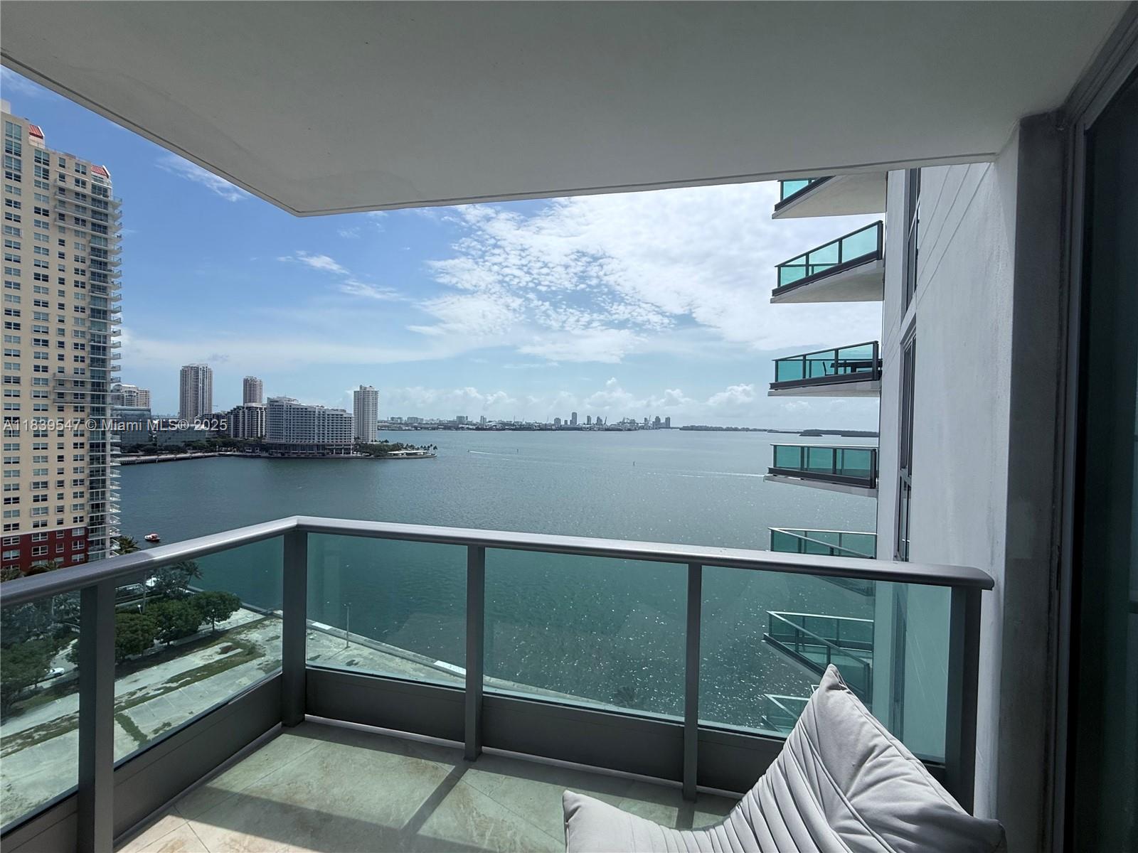 Furnished unit at Jade Building. This large corner unit has lots of natural light. 2/2 with marble floors throughout, eat-in kitchen, remodeled bathrooms, wrap around terraces with Bay and City views.