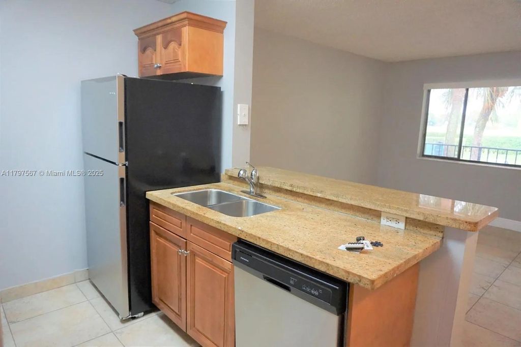 Photo of 1722 W Meadows Cir W #1722, Boynton Beach, FL 33436 (MLS # A11797567)