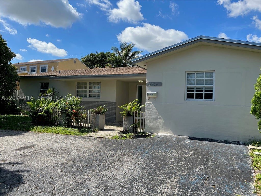 Photo of 5966 NW 15th Ct, Sunrise, FL 33313 (MLS # A12074916)