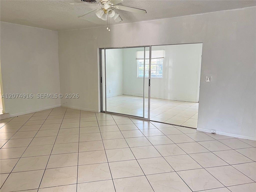 Photo of 5966 NW 15th Ct, Sunrise, FL 33313 (MLS # A12074916)
