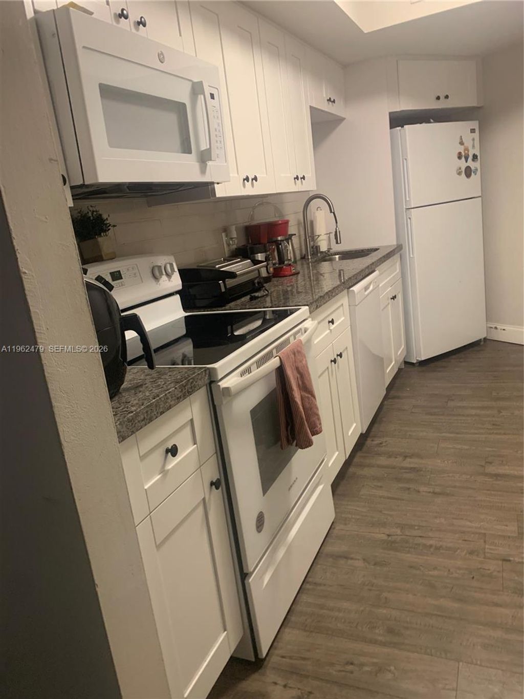 Photo of 505 Spencer Dr #101, West Palm Beach, FL 33409 (MLS # A11962479)