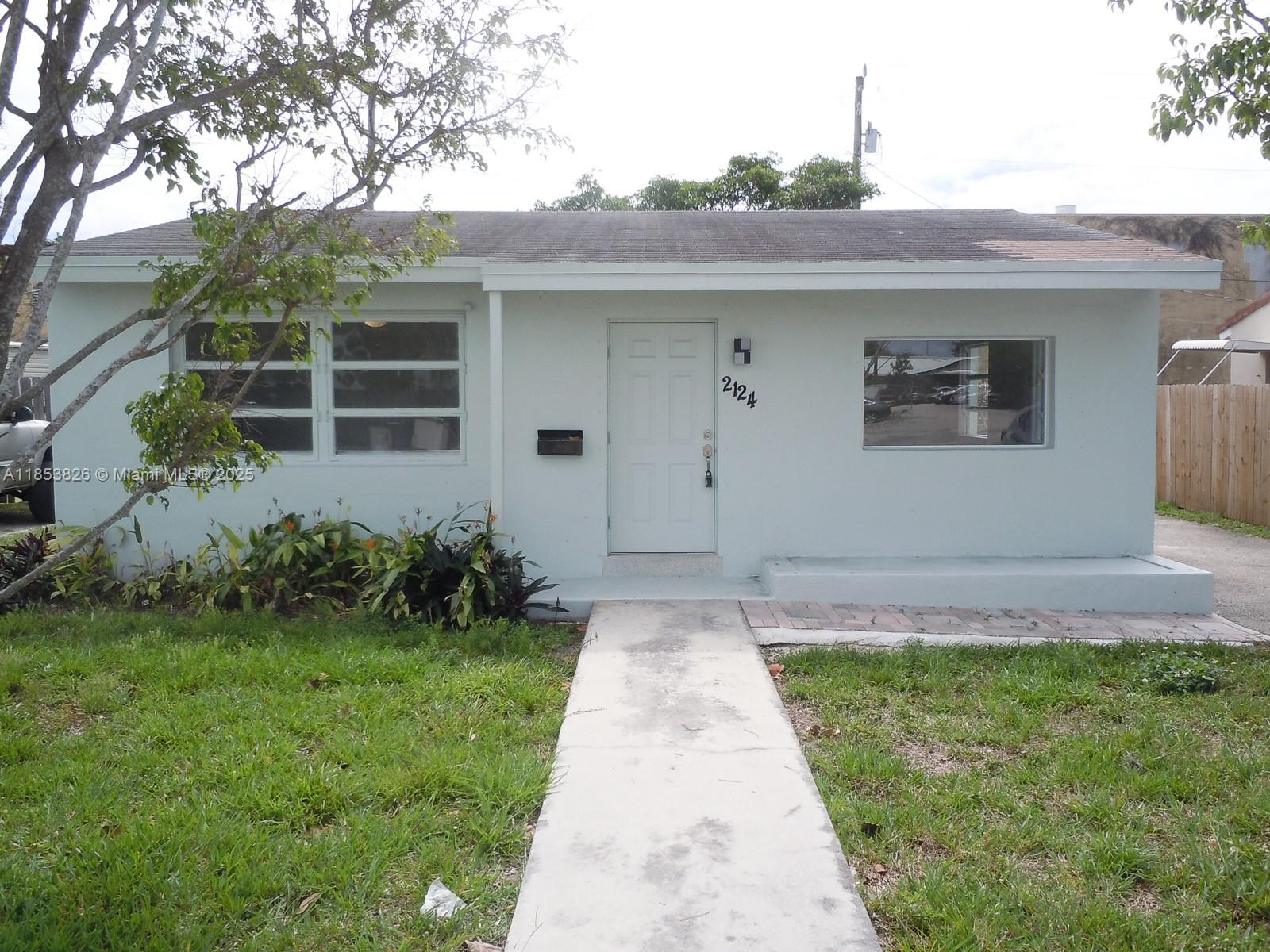 Comfort and affordability at its BEST. This great unit features 2 bedrooms and 1 bathroom, terrazzo floors, new washer and dryer in the unit, updated kitchen with new stainless steel appliances, granite tops, and wood cabinets. The whole house has been painted, has new shades, modern light fixtures, offers plenty of natural light, a COMPLETE REMODELED BATHROOM, and a very big backyard, perfect for entertaining family and friends. The two rooms are spacious as well with a nice garden view. Additionally, NEW AC, and new electric panel. The house is centrally located, very close to all major roads like Dixie Hwy, I-95, and needless to say, just a short drive to Downtown Hollywood and all the entertainment area this city has to offer. Hurry up, it won’t last, GOING GOING GONE!!!