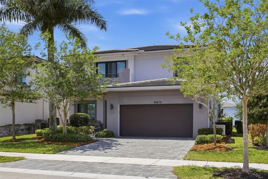 Exquisite Carrington Model with elegant curb appeal and a grand entrance in one of the area’s most desirable communities. Designed for luxury living and entertaining, this exceptional home features a chef-inspired kitchen with oversized center island, quartz countertops, premium stainless steel appliances, gas cooktop, double wall ovens, and sunny breakfast area. Spacious living and dining room combination plus a separate family room enhanced by a custom built-in wall unit and convenient full bath downstairs.
Upstairs, secondary bedrooms share a Jack-and-Jill bath and enjoy access to an exterior balcony. The luxurious primary suite is a private retreat with double closets and a spa-style bath featuring an oversized walk-in shower. Enjoy tranquil canal views and serene surroundings from your spacious yard with room for your dream oasis plus a charming gazebo with a retractable shade for relaxing or entertaining. Premium upgrades include a Generac whole-house generator and whole-home water purification system.
Residents enjoy access to two resort-style clubhouses with pools, splash zone, tennis courts, basketball courts, fitness center, aerobics studio, spa, billiards room, grand ballroom, tot lot, and more. Luxury, lifestyle, and location come together beautifully in this remarkable residence.