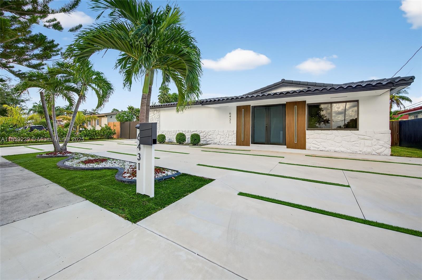 Bask in modern sophistication in this fully reimagined 5-bed, 4-bath Miami pool & canal home. Enjoy the expansive living & dining spaces across 2,188 sq ft of interiors. The chef’s kitchen, with dual refrigerator/freezer & generous island, makes entertaining a breeze. Both primary & junior suites open directly to the resort-style pool, blurring indoor/outdoor boundaries. On an 8,250 sq ft lot, this turn-key residence blends elegance, comfort & practicality, perfect for multi-generational living or working from home. Enjoy South Florida living near shops, dining & top rated schools!