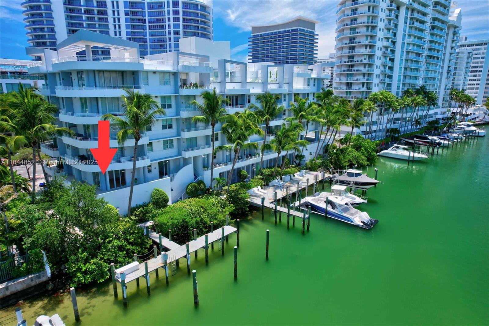 DIRECT INTRACOASTAL WATER VIEWS from this CORNER LANAI featuring an OVERSIZED WRAP-AROUND COVERED TERRACE w/ nearly 900 SqFt and water hose. Enjoy 9-ft ceilings w/ floor to ceiling glass, bamboo wood floors, an open kitchen w/ granite countertops & Thermador induction cooktop. Split-bedroom floor plan, formal dining & living rooms. Primary suite offers water views, terrace access, walk-in closet & marble bath w/ dual sinks, Jacuzzi & separate shower. Includes RARE COVERED TANDEM PARKING for 2 cars + Kayak storage & guest parking. Well maintained building w/ no upcoming projects. Monthly dues include full reserves, cable, internet & more. Great amenities include rooftop heated pool, hot tub, sauna, fitness center, marina to launch your paddleboard! Short walk to the beach! Pet Friendly!