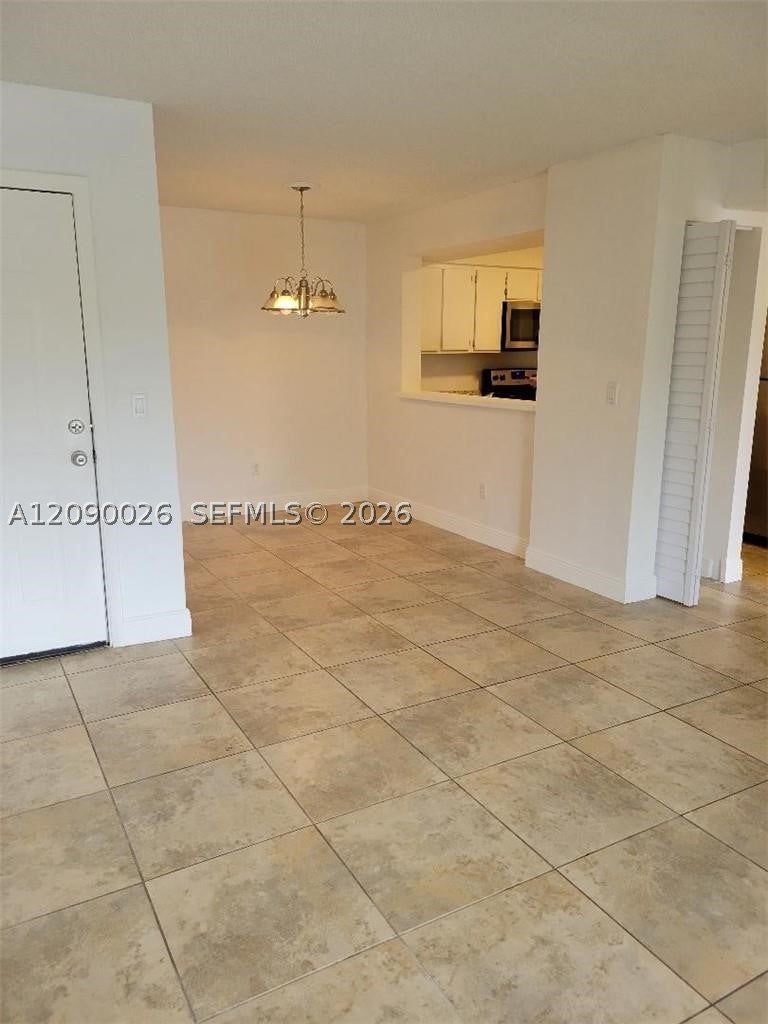 Photo of 1229 SW 46th Ave #403, Pompano Beach, FL 33069 (MLS # A12090026)