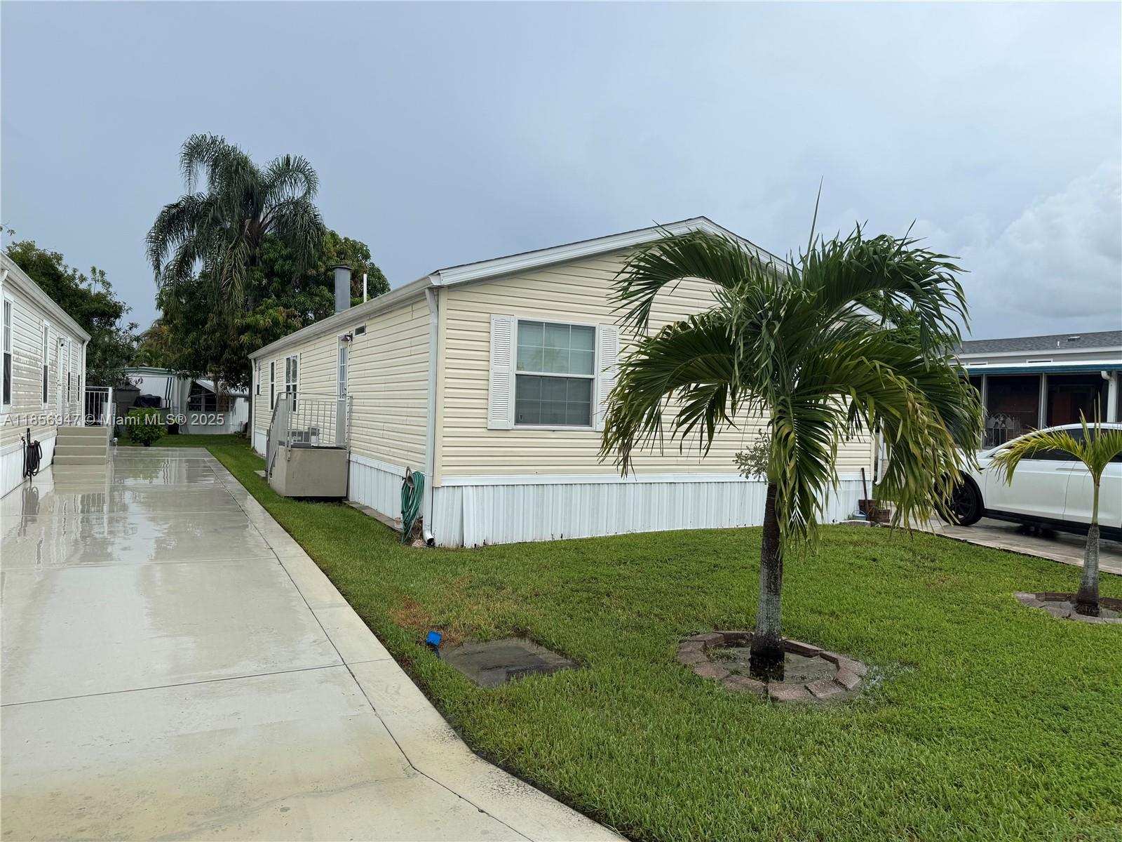 3/2 doublewide built in 2006,stamp concrete driveway,has shed in backward,has impact windows and doors.split bedrooms.Has updated kitchen and bath.