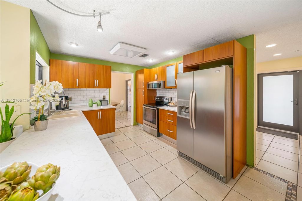 Photo of 14811 Archerhall St, Davie, FL 33331 (MLS # A11912705)