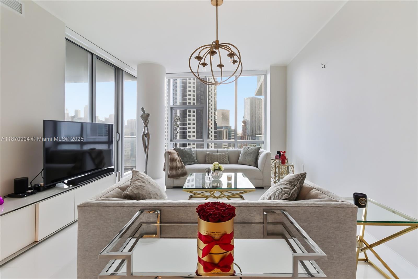 Designer Decorated 3 bedroom PLUS DEN/ 4 bath, 10 FT ceilings/ with private elevator lobby leading directly into this beautiful condo at Miami World Center, very light, bright and spacious, European kitchen, good size balcony with SE-view of the Bay, ocean and city skyline which is very impressive night and day. This is the building with the most amenities not only in Miami but in the entire US, including a soccer field, tennis courts, a boxing ring, a yoga court, basketball, state of the art gym, spa and wellness. 5 star amenities for your enjoyment! Great location! Walking distance to the Opera House and American Airlines Arena or just hop on the train to the airport or other destinations, minutes to the beaches.