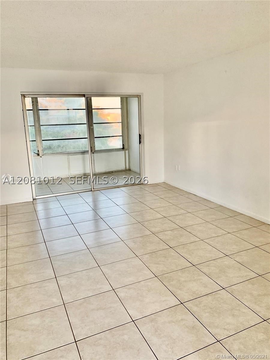 Photo of 8220 Sunrise Lakes Blvd #307, Sunrise, FL 33322 (MLS # A12081012)