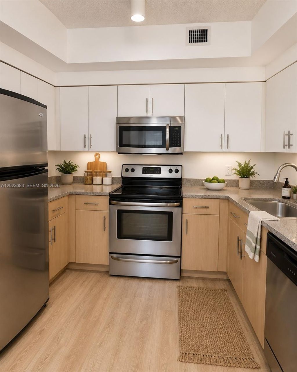 Photo of 7930 N Nob Hill Rd #106, Tamarac, FL 33321 (MLS # A12023083)