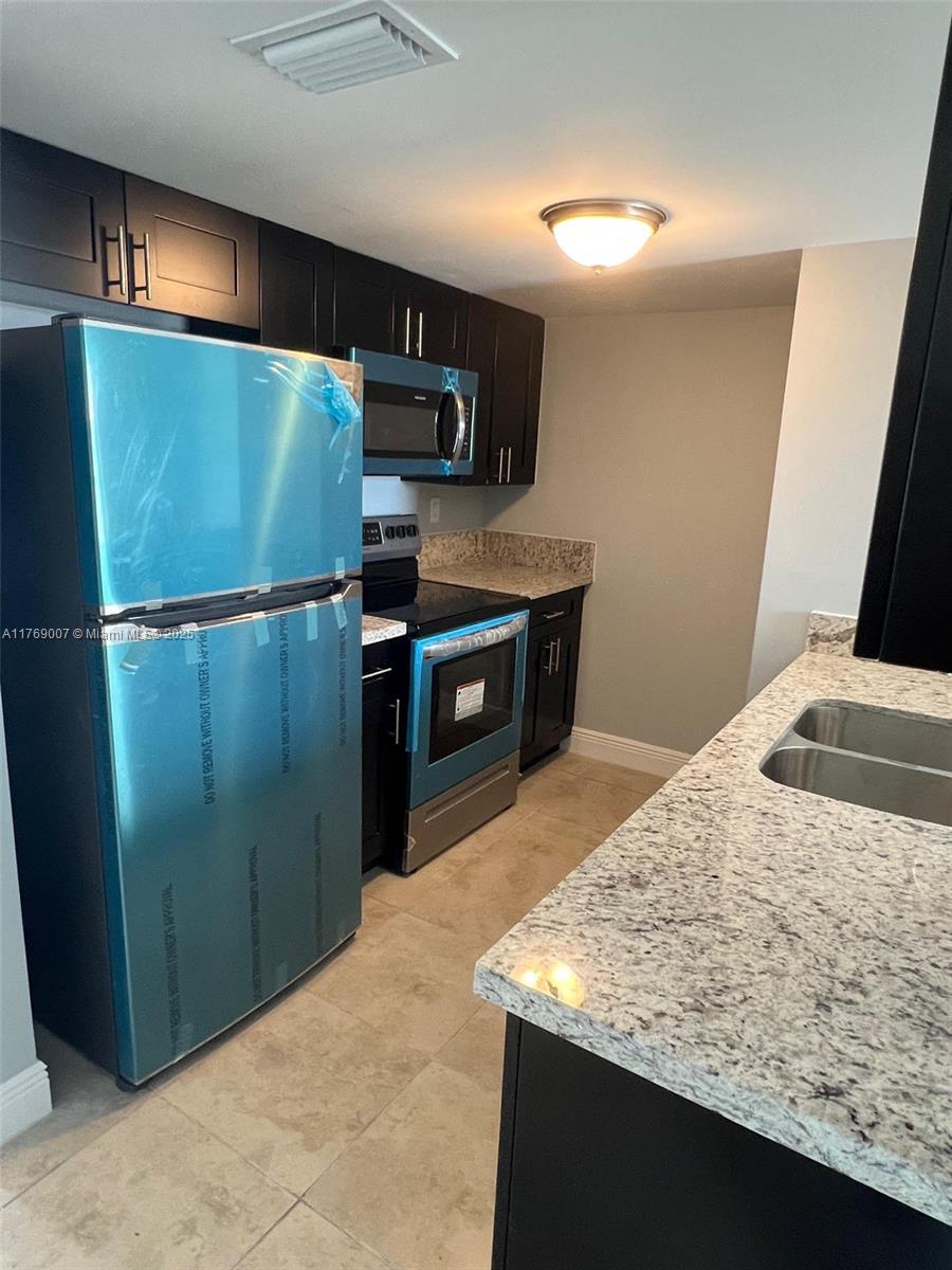 1955 Nw 5th Pl 12, Miami, Broward County, Florida - 3 Bedrooms  
2 Bathrooms - 