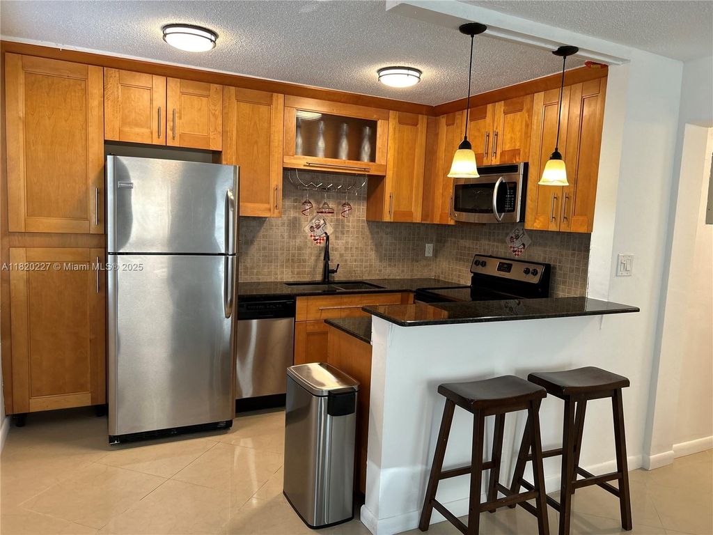 Photo of 2862 NE 32nd St #10, Fort Lauderdale, FL 33306 (MLS # A11820227)