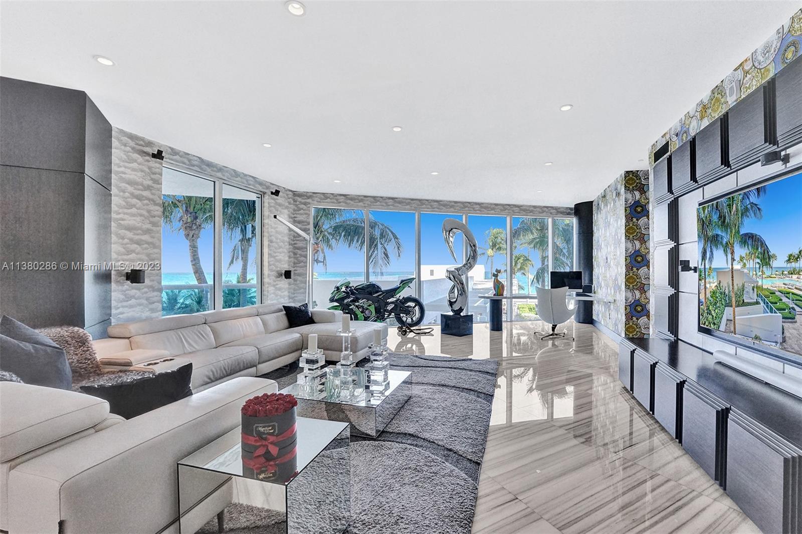 Wow! Jewel of Luxurious Trump Hollywood! Beach Lanai w/Private Deck Overlooks the Beach w/Jacuzzi. Over a Million$ in renovations. private elevator foyer to this 3952 SF 3B 3.5Ba+Media Rm & Laundry Rm,2 STORY SHOWPLACE BEING SOLD TURNKEY! Ocean Views! Contemporary Masterpiece! Finest Finishes& custom Furniture: Versace, Cavalli, Chanel & Alligator Couch, Smart system, 48" White Marble Flrs, Custom Doors, Lutron+Murano Italian Glass Lighting, Theatre/Nightclub w/Laser Lights, Smoke Machine&Sound System! Fabulous Art! Nothing Original
Remains! Walk Out to Pool! Special Rare Residence w/All The Privacy of a House & Amenities of a Condo -
Unsurpassed Amenities: Breakfast Rm,Wine+Cigar Lounges,Fitness Center,Tennis,Spa,Massage Rm,Theater,Party
Rm,Pool+Beach Service,24h Security,Valet & more!