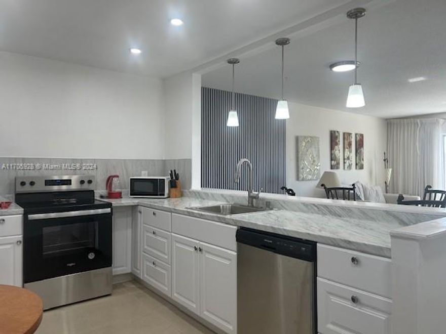 All ages building! Spacious and luminous 2 bedrooms /2 bathrooms corner unit on top floor overlooking garden and pool area! Tastefully renovated, open concept kitchen, porcelain floors throughout, large balcony. Meadowbrook offers peaceful living in a great area. Unbeatable location! Walking distance to shops, restaurants, public transportation and a short ride to beaches, Golfstream park racing and casino, Aventura Mall and much more! Low maintenance fee which includes water & sewer, parking, cable, pool, laundry facilities, etc. Best deal at this price!
