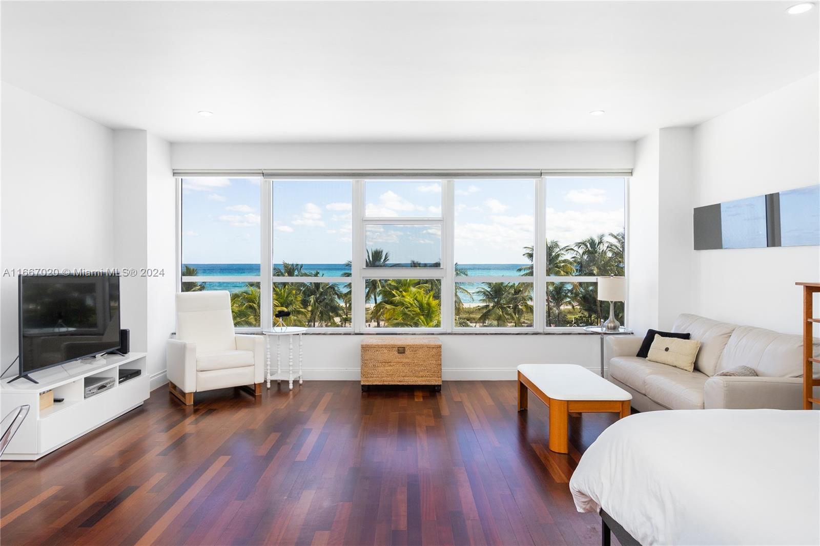 Experience breathtaking oceanfront views from this rare and spacious studio at The Executive, an oceanfront MiMo gem designed by Robert Swartburg. This large, light-filled studio offers a generously sized living area, an open kitchen, and a large walk-in closet. With beautiful wood floors, it offers a serene and inviting atmosphere. Ideally suited for ocean lovers, this studio provides direct beach access and is located just moments from Miami Beach’s renowned shopping, dining, and boardwalk. The Executive’s boutique charm and prime location make this a highly sought-after residence. To further enhance your beachside lifestyle, purchase a cabana for sale (MLS#A11643742 & A11643738). Whether as a primary home or a weekend retreat, this is the perfect opportunity to enjoy Miami Beach living.