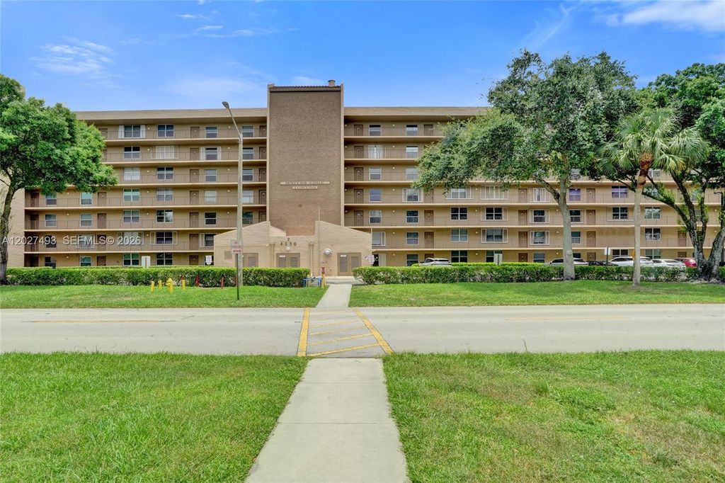 Photo of 4550 NW 18th Ave #306, Deerfield Beach, FL 33064 (MLS # A12027493)