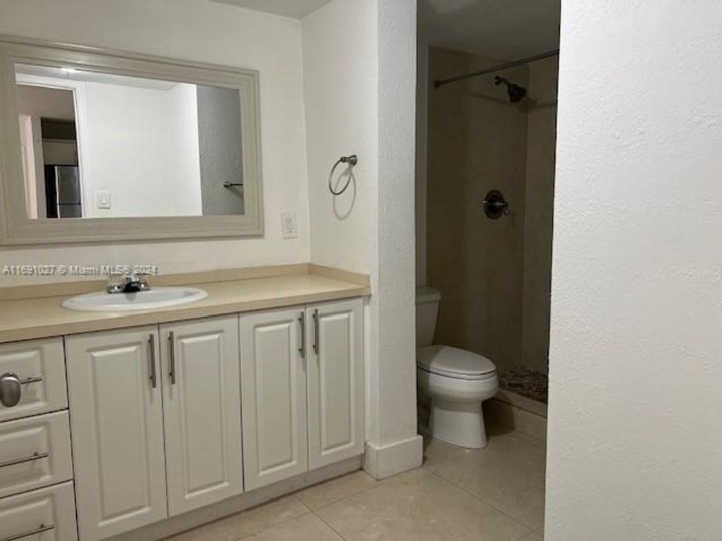 Photo of 10701 Cleary Blvd #103, Plantation, FL 33324 (MLS # A11691027)