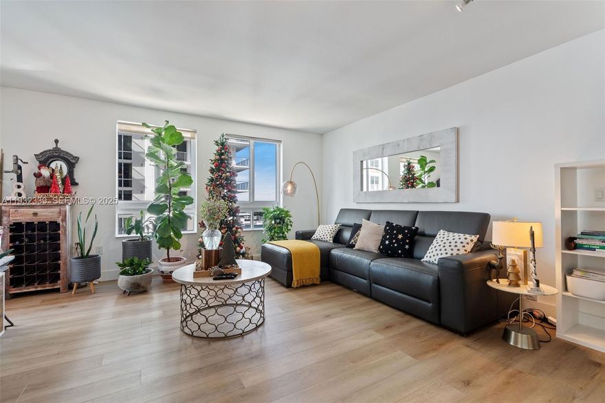 Beautifully updated 2-bedroom, 2-bath condo in the heart of Dadeland! This light-filled unit features an open layout with spacious living and dining areas, complemented by large windows and a private balcony offering city views. The modern kitchen boasts granite countertops, stainless steel appliances, wood cabinetry, and a stylish backsplash. Both bedrooms are generously sized with ample closet space, and the primary suite includes an en suite bath with a walk-in shower. Bathrooms showcase elegant tile work and contemporary finishes. Enjoy wood-look flooring throughout, in-unit laundry, and plenty of storage. Located in a sought-after building with resort-style amenities including pool, fitness center, and 24-hour security. Steps from Dadeland Mall, dining, and MetroRail for easy commuting. Don’t miss this move-in ready gem!