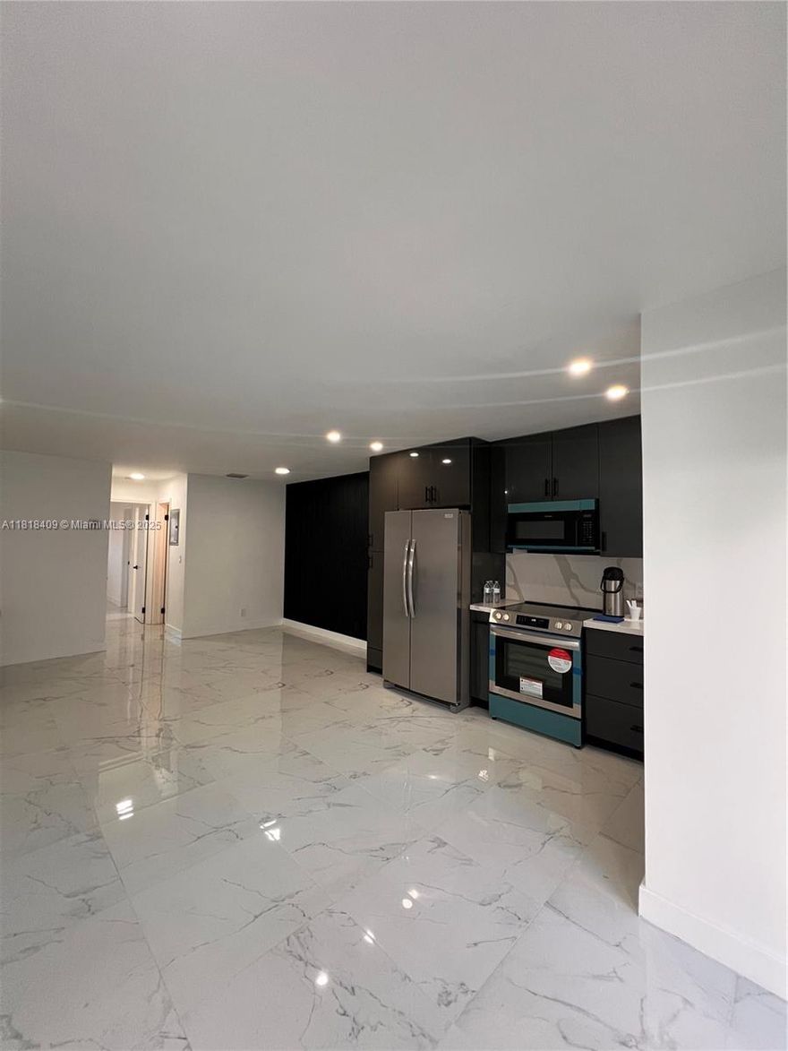 Back on the market! This spacious and updated 1 bed, 1.5 bath condo is ready to sell and open to negotiation. Located just minutes from the beach, it features tile floors throughout, a large master suite, and covered parking. Perfect as a primary residence or investment. Seller is motivated—bring your offers!