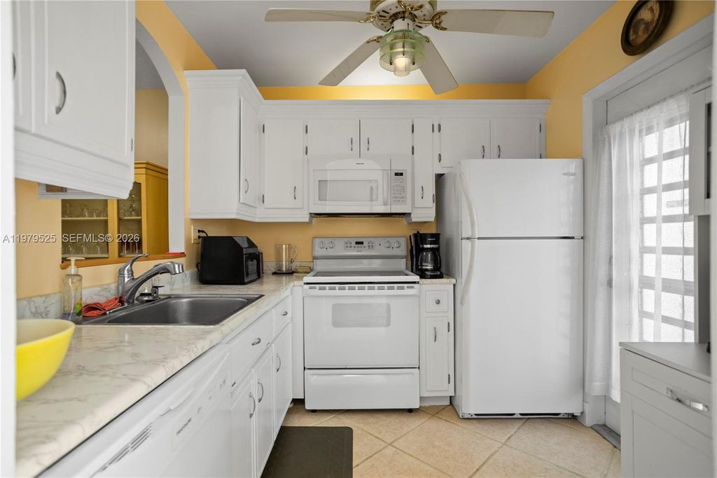 Photo of 4411 NW 16th St #F201, Lauderhill, FL 33313 (MLS # A11979525)