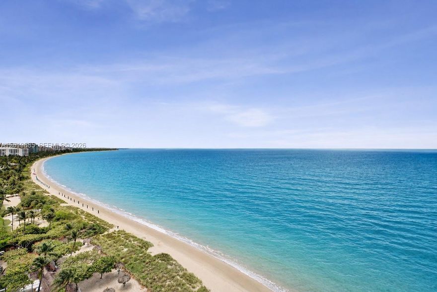 This highly sought after oceanfront corner residence offers an exceptional combination of privacy, light, and breathtaking panoramic views from every window. Ideally positioned in the most desirable B08 in the building, this unit features coveted Southeast exposure with sweeping vistas of the ocean, the South and North shorelines,  State Park, and where the Atlantic Ocean meets Biscayne Bay. Floor to ceiling impact windows and doors providing exceptional natural light throughout. The result is a seamless indoor, outdoor feel that enhances the home’s open and airy ambiance. Beautifully remodeled, the residence features natural stone flooring, custom cabinetry, ample closets, eat-in kitchen and special designer touches throughout. Parking space #61 in the upper garage. Special assessment has been paid in full.