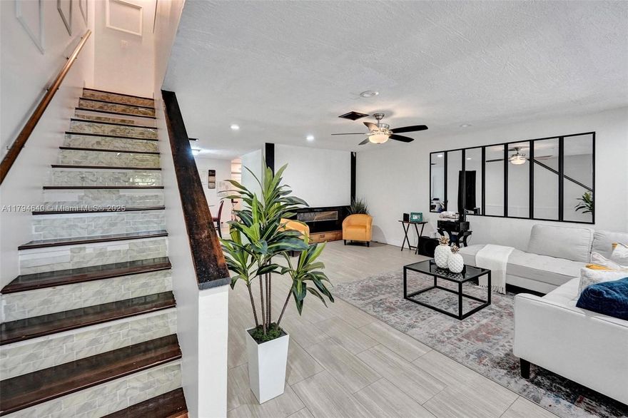 This beautifully remodeled 2 bedroom, 2.5 bathroom townhome in Deerfield Beach offers the modern style and comfort today’s buyers look for. The home features updated kitchen, bathrooms, flooring, stairs, and lighting creating a clean, cohesive, move-in-ready space from top to bottom. Both bedrooms include their own private bathrooms, and a convenient half bath is located downstairs for guests. Enjoy fresh air and extra living space on the screened-in patio, perfect for relaxing or entertaining. Located in a quiet, well-kept community just minutes from the beach, major highways, shopping, dining, and local parks, this townhome delivers low maintenance living in a prime South Florida location. Come see it for yourself, this one truly feels like home.