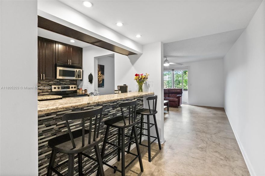 Large 2 bedroom 2 bath condo on 2nd floor of three story building, small complex with only 76 units, water and garden views, community has clubhouse & pool, open assigned parking and plenty of guest parking, Walk to a rated schools, new CVS store on Sample Rd. pet friendly complex with newer roofs and recently painted. Surrounded by brand new houses and the Coral springs country club tower. Listed in As-IS condition, all other appliances included, newer carpet, nice snack bar. There is a communal washer and dryer available on the same floor.