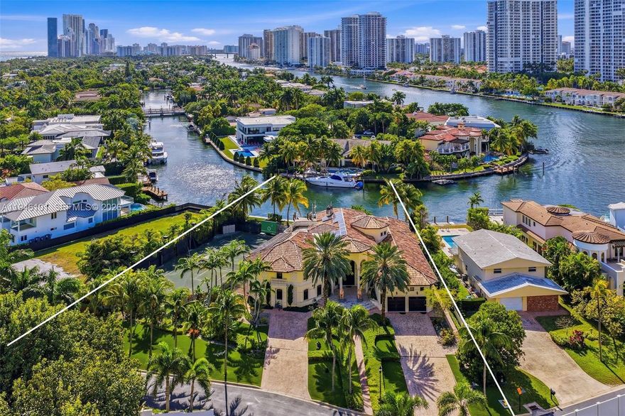 Welcome to 680 Golden Beach Drive, a true legacy estate set behind the world-famous gates of Golden Beach. Spanning nearly 29,000 sq ft, the property commands 135 ft of open, private water frontage and offers a rare, professionally built clay tennis court with night lighting. The nearly 9,000 sq ft residence is light, bold, and dramatic, defined by soaring ceilings and expansive living spaces that open to outrageously lush grounds. With a private beach, dedicated police department, and palm-lined sidewalks leading to neighborhood parks, this is not just a home - it’s an experience found in only a handful of places in the world.