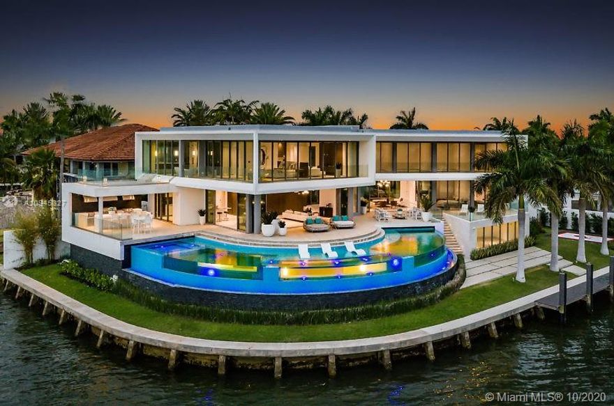 FANTASTIC RARE OPPORTUNITY TO OWN A MANSION IN THE EXCLUSIVE GATED SANS SOUCI ISLAND. BREATHTAKING PANORAMIC WIDE BAY VIEWS. FEATURING 255 FT ON THE WATER. ULTRA MODERN 19,266 SF TOTAL NEW CONSTRUCTION JUST COMPLETED OCT/2020. EXCLUSIVE CURVE 102 FT LONG POOL WITH EXTERIOR VIEWS THROUGH 6 LARGE CURVE CLEAR GLASS PANELS. TOP OF THE LINE CONSTRUCTION AND FINISHES. WIDE WATER VIEWS FROM EVERY ROOM. *OWNER FINANCING AVAILABLE*