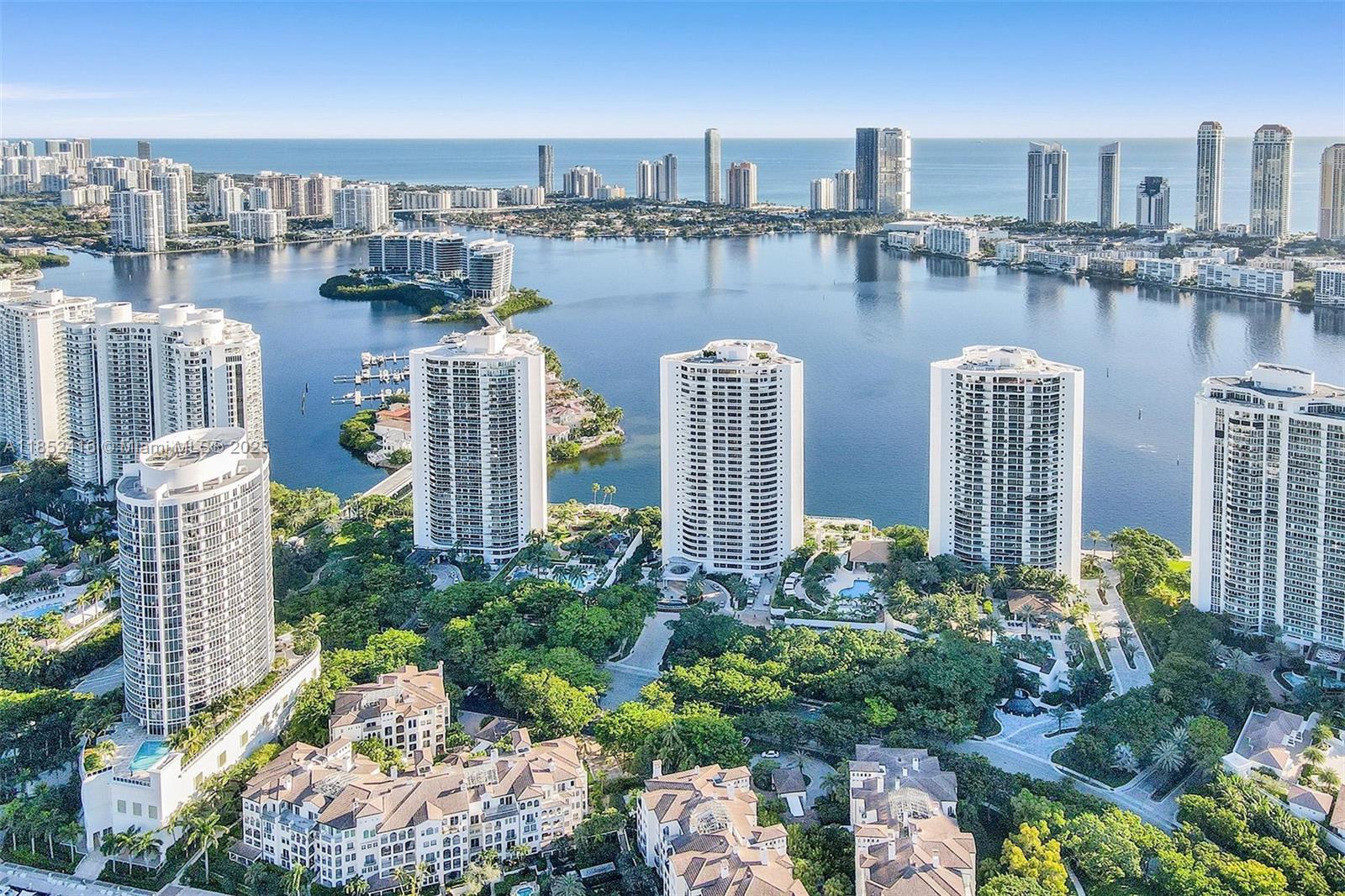 WOW! SPECTACULAR WATER VIEWS FROM EVERY ROOM! NEW KITCHEN WITH ALL NEW APPLIANCES. THIS PRISTINE LIGHT & BRIGHT COVETED SPLIT BEDROOM FLOOR PLAN WITH TILE FLOOR THROUGHOUT HAS A LARGE BALCONY OVERLOOKING THE WATER. CUSTOM CLOSETS, UTILITY ROOM W/WASHER/DRYER, & BRAND NEW AIR CONDITIONER.
BUILDING HAS ALSO BEEN RENOVATED! THIS 84 ACRE ISLAND PARADISE OFFERS COUNTRY CLUB AMENITIES FEATURING A 27,000SF W/CLASSES, INDOOR SWIMMING POOL, 16 COURT TENNIS & PICKLE BALL CLUB,3 RESTAURANTS, DELI, CHILDREN'S PLAYGROUND, ONSITE MARINA & MORE