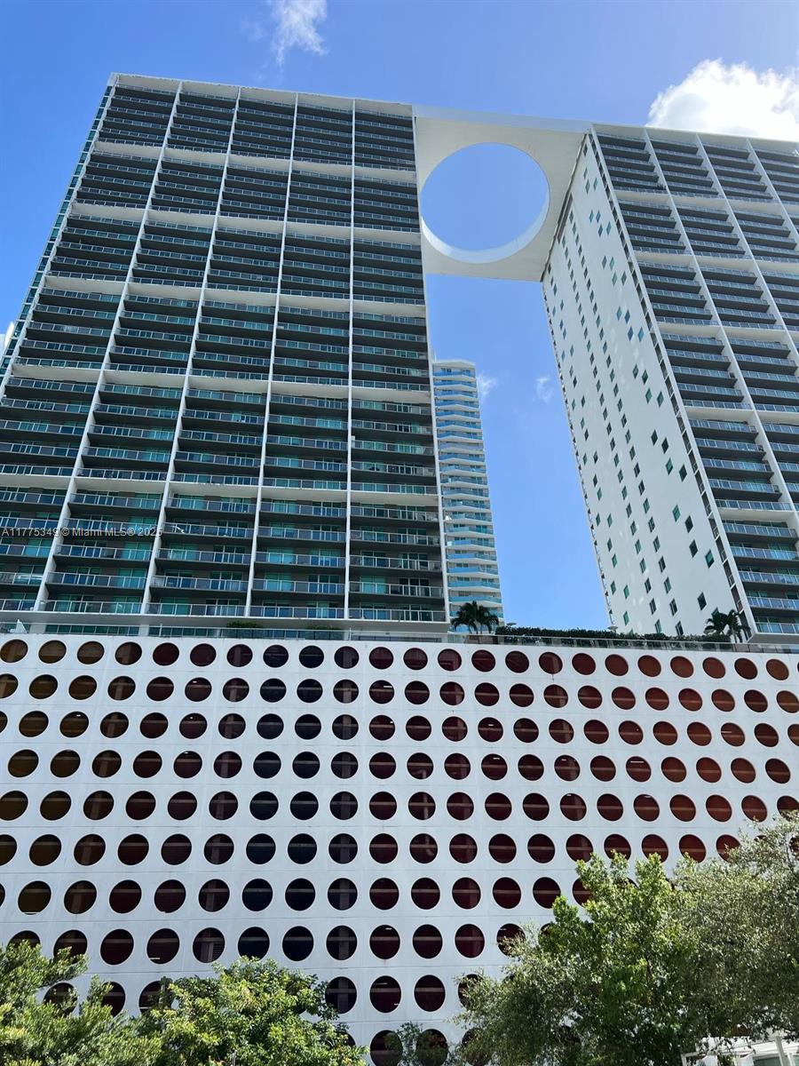 Experience modern urban living at its finest in this stylish apartment, 2 bedrooms and 2 bathrooms, at 500 Brickell Condominium and fully furnished. Located in the heart of Brickell, this residence offers breathtaking city and bay views, topnotch amenities, and a prime location near vibrant dining, shopping, and entertainment options. Enjoy spacious interiors, premium finishes, and access to a stunning rooftop pool, fitness center, and concierge services, making it the perfect blend of luxury and convenience." Let me know if you'd like more details on any specific features!
