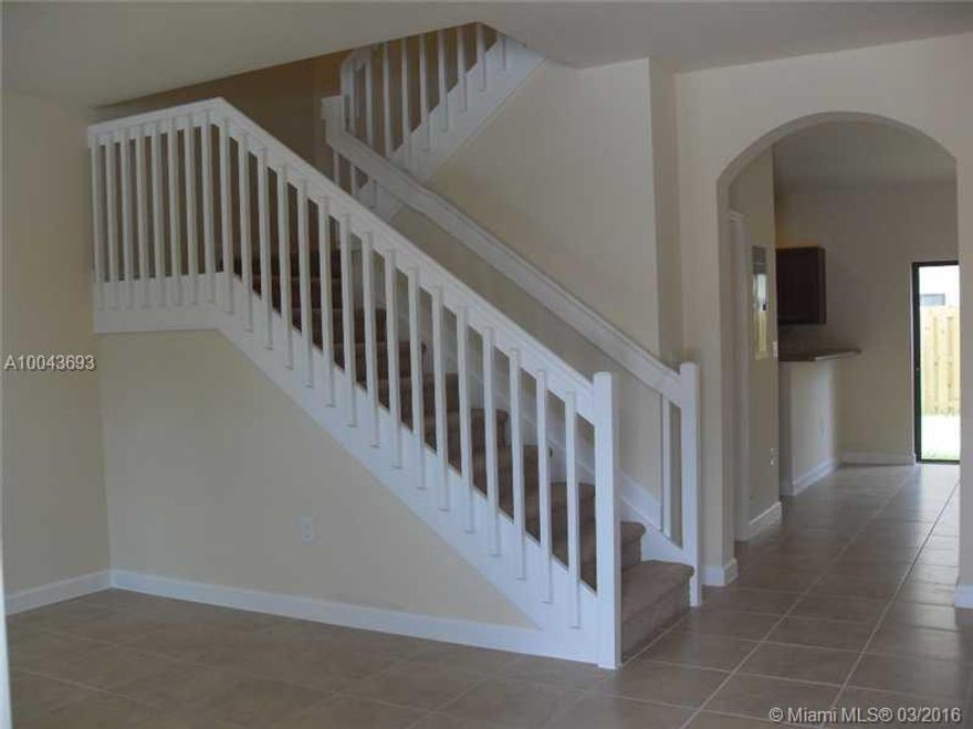 Beautiful townhouse, great & spacious 3 beds floor plan. Everything is pretty new in the unit. Tile in the first floor. Big refrigerator. Nice fenced patio; storage room; nice community with a club house with tons of amenities. Accordion hurricane shutters in the property. You must see it.