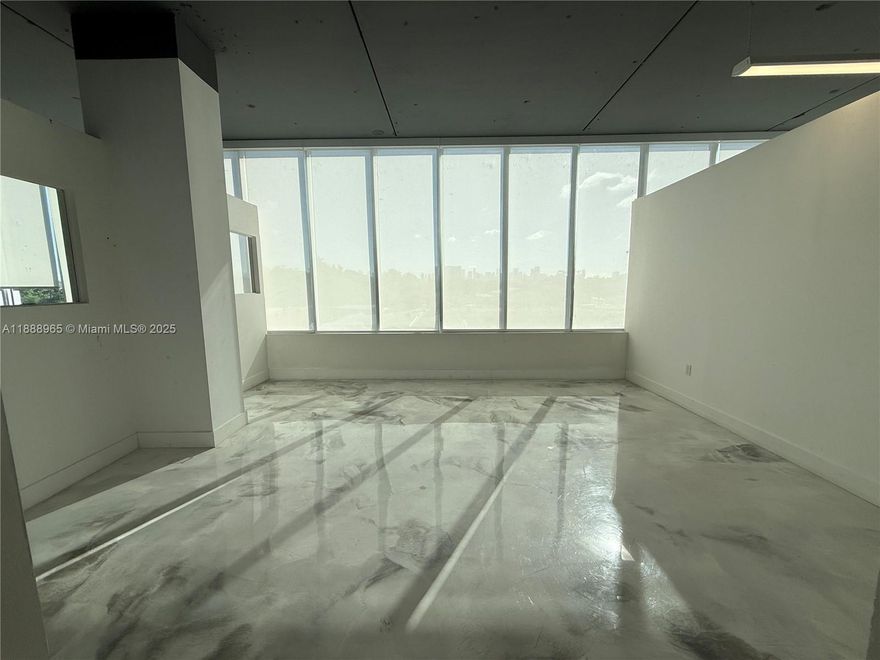 Newly renovated offices for lease in prime City of Miami location. New flooring, new AC, new baseboards. Located
at 42 NW 27th Ave, the Del Toro Insurance building. Offices available are on the third floor. Utilities included. Total
available sf is 11,630 SF. 7,978 sf is contiguous space but the entire 11,630 sf can be leased and is in the same
side of building. NNN costs are estimated at $6 PSF. Plentiful parking available on ground level of building.
Landlord will provide some rent abatement for buildout.