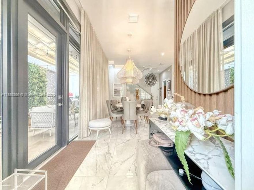 PRIME Location in a main street just a one block walking of Downtown Doral, SINGLE FAMILY home in Canarias model Cadiz, this stunning residence featuring high-end upgrades throughout. Enjoy elegant porcelain floors downstairs and wood floors upstairs, creating a sophisticated ambiance. the upgraded kitchen boasts premium cabinetry, luxury countertops and designer faucets. The master bedroom has been fully upgraded. Additional highlights include systems electrical systems with electric curtains, home automation, washer and dryer and a garage with ceiling storage shelves. All the bedrooms incorporate  their own bath.  The 4th bedroom is a DEN. The private patio is perfect for relaxing or simply enjoying the outdoors. A few steps for Trump National Doral and University of Miami Hospital.