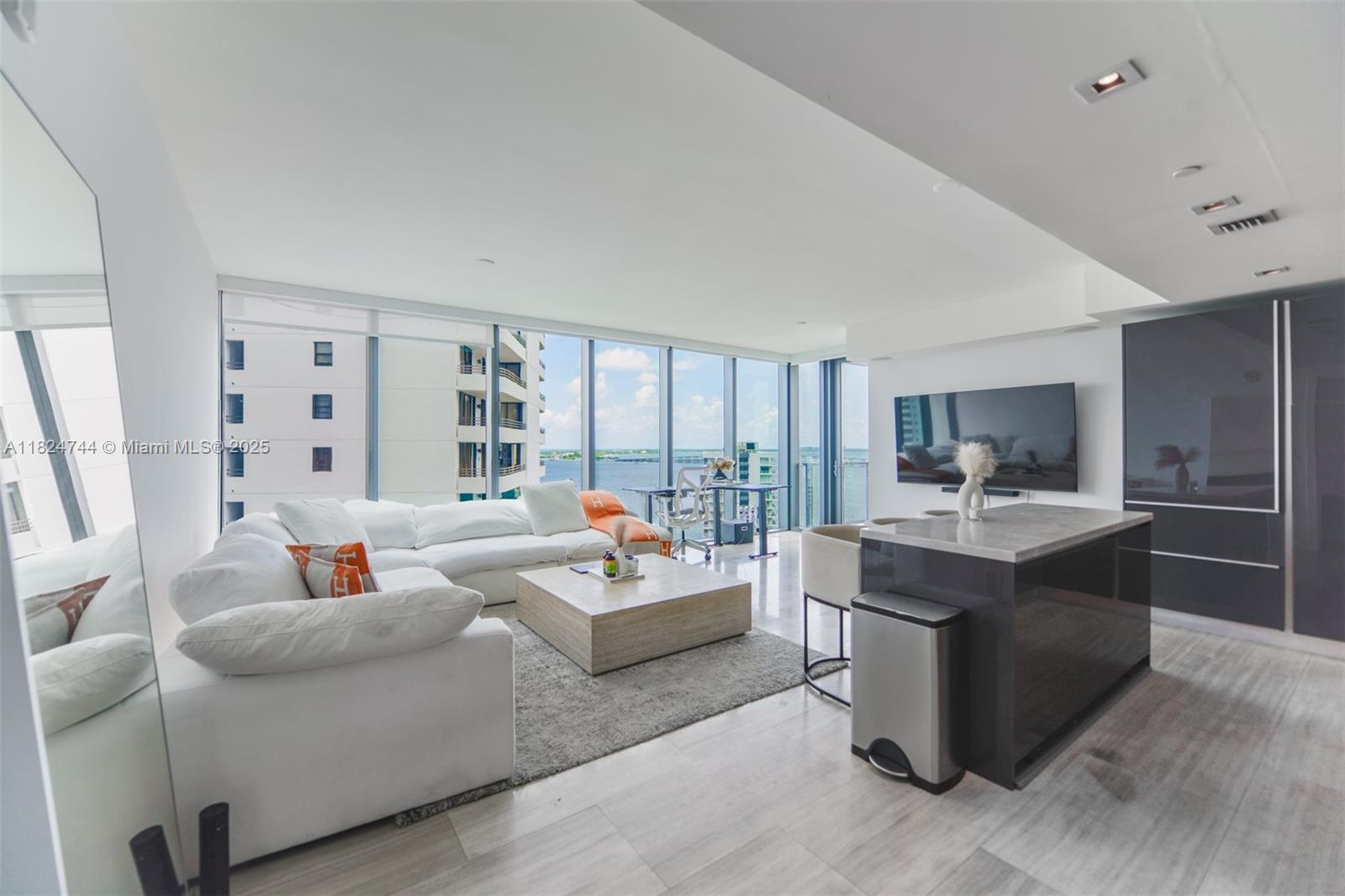 Glamorous 2 Bedroom, 2.5-Bath residence at the exclusive 5-star Echo Brickell, designed by world-renowned architect Carlos Ott. This corner unit features an expansive terrace with a built-in BBQ and sweeping views of Brickell and Biscayne Bay, Both SUNRISE & SUNSET. Interior highlights include floor-to-ceiling sliding glass doors, marble floors, a custom walk-in closet, automated shades, a built-in espresso machine, and top-tier Italkraft finishes with Wolf & Sub-Zero appliances. Fully integrated with Apple smart home technology, this turnkey home includes two valet parking spaces and access to resort-style amenities: an infinity-edge pool with bay and skyline views, Jacuzzi, state-of-the-art gym, spa, 24/7 concierge, valet, security, and an on-site café offering wine, beer, and snacks