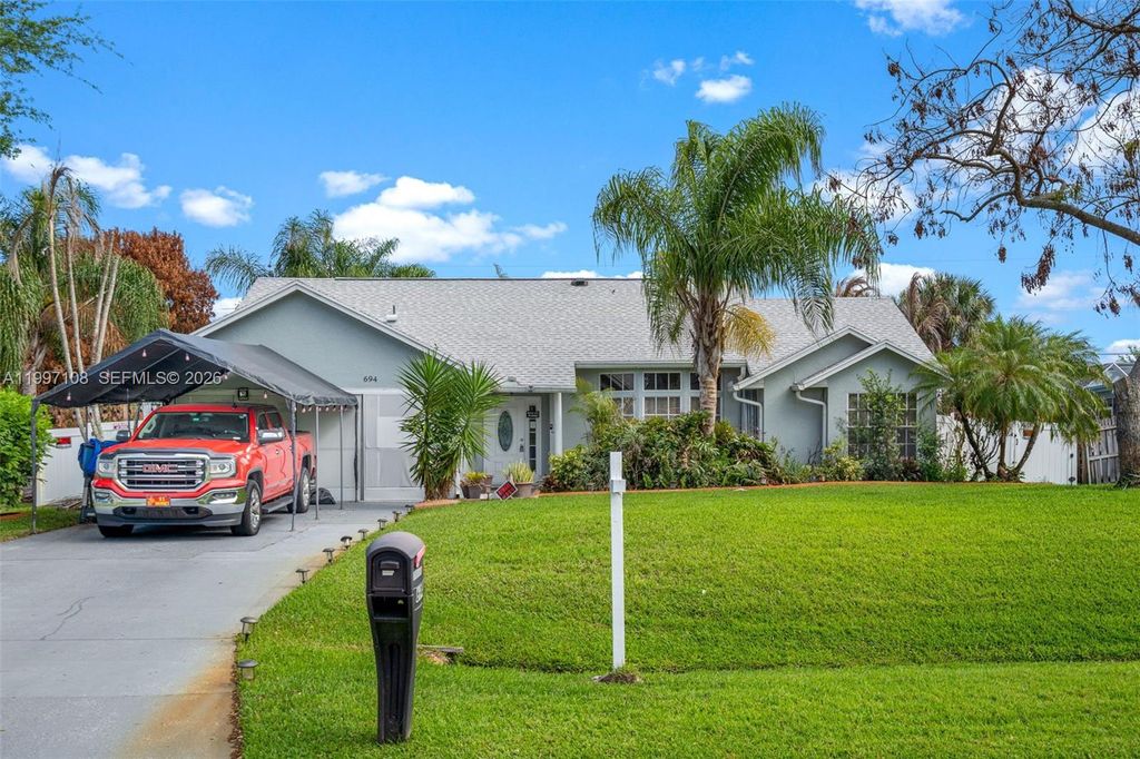 Photo of 694 SE Karrigan Ter, Port St Lucie, FL 34983 (MLS # A11997108)