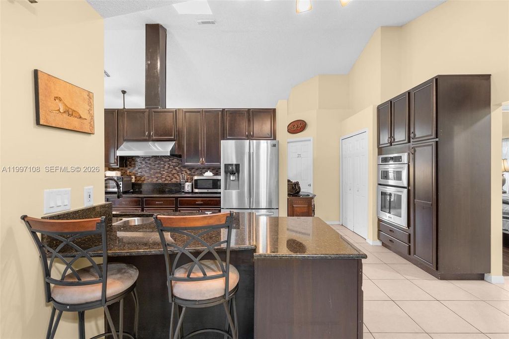 Photo of 694 SE Karrigan Ter, Port St Lucie, FL 34983 (MLS # A11997108)