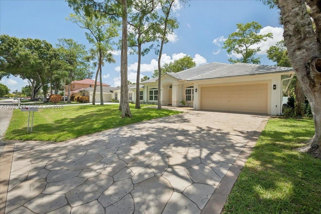 Photo of 6508 NW 54th Ct, Lauderhill, FL 33319 (MLS # A12024818)